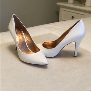 White BCBG pumps.